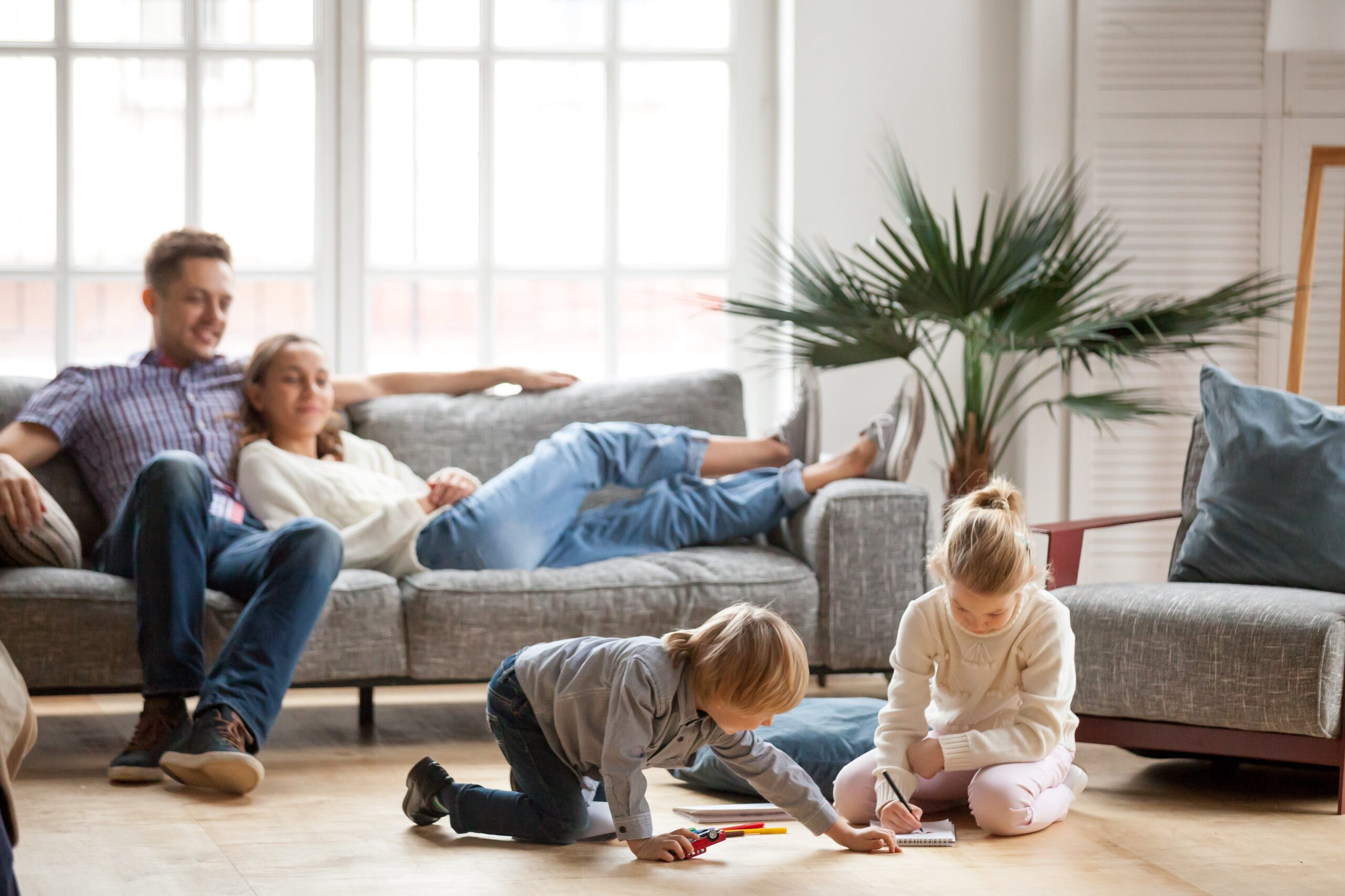 Family enjoying time together in their living room.